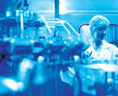 A futuristic laboratory scene illustrating sustainable green pharmaceutical manufacturing with eco-friendly materials and renewable energy sources.