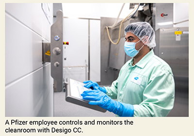 A pfizer employee controls and monitors the cleanroom with desigo CC.