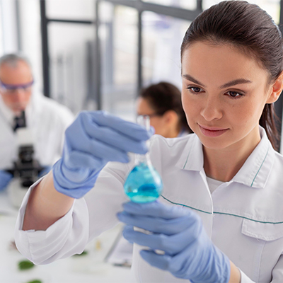 Laboratory technician analyzing peptide samples for quality control