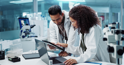 Pharmaceutical scientist analyzing drug development data