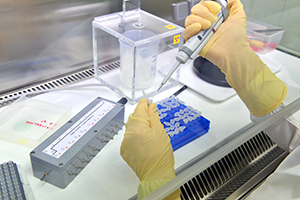 Laboratory technician conducting drug analysis with mass spectrometry
